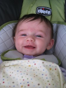 A rare shot of me smiling in my car seat! 